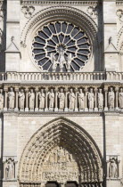 The West Rose Window and Portal of The Virgin on the Gothic medieval Notre Dame Cathedral on Ile De La CiteEuropean French Religion Western Europe