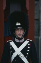 Portrait of guard outside the Amalienborg Palace.Danish Danmark European Northern Europe Scandinavia