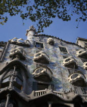 Casa Batllo by Antoni Gaudi. Manzana de la Discordia or Block of Discord at 43 Passeig de Gracia.  Exterior facade. Barna Catalunya Espainia Espana Espanha Espanya European Gray Hispanic Southern Eur...