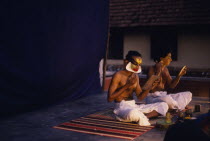 Kathkali dancers applying make up. Asia Asian Bharat Inde Indian Intiya Kerela Kerala Asia Asian Bharat Inde Indian Intiya Kerela Kerala