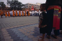 Child watching ordination of novice monks.Asian Kids Prathet Thai Raja Anachakra Thai Religion Siam Southeast Asia Religious Siamese Asian Kids Prathet Thai Raja Anachakra Thai Religion Siam Southea...