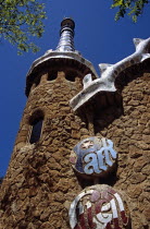 Guell Park sign on building at entrance to Park GuellTravelTourismHolidayVacationExploreRecreationLeisureSightseeingTouristAttractionTourGuellParkParcBarcelonaSpainSpanishEuropeEuro...