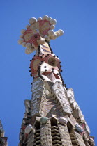 La Sagrada Familia colourful cathedral steeple detail.TravelTourismHolidayVacationExploreRecreationLeisureSightseeingTouristAttractionTourLaSagradaFamiliaBarcelonaSpainSpanishEurope...