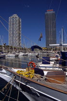 Port Olimpic  Bow of yacht  marina  Hotel Arts and Torre MapfreTravelTourismHolidayVacationExploreRecreationLeisureSightseeingTouristAttractionTourPortOlimpicOlympicBarcelonaSpainSpan...