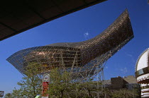 Port Olimpic  Frank Gehrys bronze fish sculpture.TravelTourismHolidayVacationExploreRecreationLeisureSightseeingTouristAttractionTourPortOlimpicBarcelonaSpainSpanishEuropeEuropeanUn...