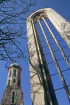 Castle Hill District  Uri Utca  Mary Magdalene Church Tower  gothic window in foreground .TravelTourismHolidayVacationExploreRecreationLeisureSightseeingTouristAttractionTourDestinationCa...