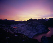 Sunset over Grimsel Pass. Oberaasee on the left and Grimselsee on the right.European Schweiz Suisse Svizzera Swiss Western Europe Wallis Polynesia Scenic Valais Many Islands Pacific Islands Polynesia...