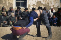 Kazakh nomad wrestlers at Kazakh New Year festivities.Asia Asian Mongol Uls Mongolian