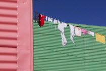 Washing drying in La Boca.ClothesLaundryGreenSouth AmericaBuenos AiresTravelTourismHolidaysLa BocaArgentinaColourPinkGreenAmerican Argentinian Color Hispanic Latin America Latino Clean C...