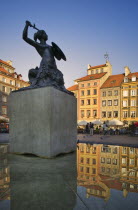 The Mermaid Fountain in Old Market SquarePolandWarsawEuropeStatueCapitalCityMonumentHistoricLandmarkReflectionWaterMermaidOld TownUNESCOEastern Europe European Polish Polska Reflexion W...