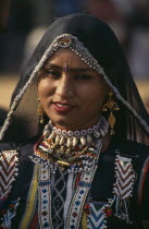 Portrait of Gulabo the most famous Kalbelia dancer in Rajasthan at the Shekhawati FestivalAsia Asian Nepalese Bharat Inde Indian Intiya Male Men Guy Male Man Guy Religion Religious Kids Learning Less...