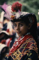 Young Kalash girl wearing traditional dress at the Chilimjusht Festival in BumburetAsia Asian Nepalese Classic Classical Historical Kids Older History Pakistani Immature One individual Solo Lone Soli...