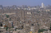 Elevated view over city rooftops with tall buildings on the skylineAfrican Middle East North Africa