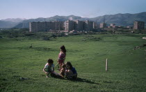 Children picking herbs on outskirts of Razdan.Armenian Asia Asian European Kids Middle East