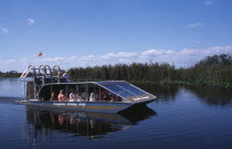 Tourists Air boating in the Everglades National ParkAmerican North America United States of America