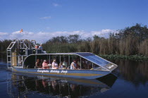 Tourists Air boating in the Everglades National ParkAmerican North America United States of America