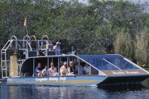 Tourists Air boating in the Everglades National ParkAmerican North America United States of America