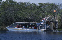 Tourists Air boating in the Everglades National ParkNorth America United States of America American