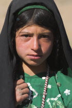 Aimaq nomad camp  Aimaq girl   The Aimaq are semi nomadic people who move out of their mud house villages after spring and live in yurts to tend their flocks before moving back to their houses in wint...