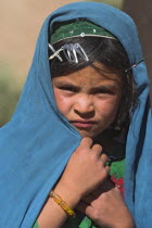 Aimaq nomad camp  Aimaq girl   The Aimaq are semi nomadic people who move out of their mud house villages after spring and live in yurts to tend their flocks before moving back to their houses in wint...