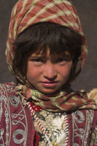 Aimaq nomad camp  Aimaq girl   The Aimaq are semi nomadic people who move out of their mud house villages after spring and live in yurts to tend their flocks before moving back to their houses in wint...