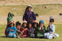 Aimaq nomad camp  Aimaq children   The Aimaq are semi nomadic people who move out of their mud house villages after spring and live in yurts to tend their flocks before moving back to their houses in...