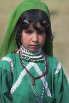 Aimaq nomad camp  Aimaq girl   The Aimaq are semi nomadic people who move out of their mud house villages after spring and live in yurts to tend their flocks before moving back to their houses in winter  between Chakhcharan and Jam