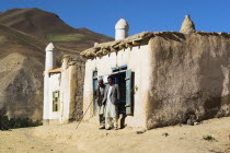 Men infront of mosque