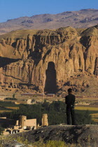 View of Bamiyan valley and village showing cliffs with empty niche where the famous carved Budda once stood  destroyed by the Taliban in 2001