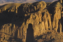 View of Bamiyan valley showing cliffs with empty niche where the famous carved Budda once stood  destroyed by the Taliban in 2001