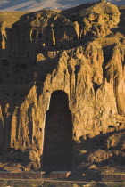 View of Bamiyan valley showing cliffs with empty niche where the famous carved Budda once stood  destroyed by the Taliban in 2001