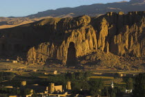 View of Bamiyan valley and village showing cliffs with empty niche where the famous carved Budda once stood  destroyed by the Taliban in 2001