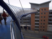 Elevated pedestrian walkway from Selfridges department store  in the Bullring centre  toward carpark.