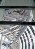 Gunwharf Quay, The Spinnaker Tower. Interior view looking down from observation deck through glass window towards the base of the tower over waterfront restaurants and shops.