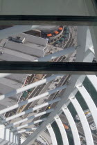 Gunwharf Quay, The Spinnaker Tower. Interior view looking down from observation deck through glass window towards the base of the tower over waterfront restaurants and shops.