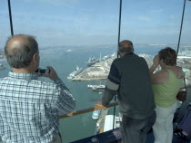 Gunwharf Quay, The Spinnaker Tower. Interior with visitors looking out of glass windows on the top observation deck  providing a 320¡ view of the city of Portsmouth  the Langstone and Portsmouth harb...