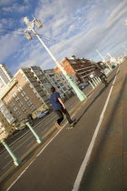 Skateboarder on the prommenade cycle lane.European Great Britain Northern Europe UK United Kingdom