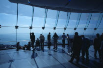 Gunwharf Quay, The Spinnaker Tower. Interior at top of tower with visitors looking out glass windows on the observation deck providing a 320¡ view of the city of Portsmouth  the Langstone and Portsmo...