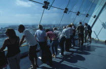 Gunwharf Quay, The Spinnaker Tower. Interior with visitors looking out of glass windows on the top observation deck  providing a 320¡ view of the city of Portsmouth  the Langstone and Portsmouth harb...