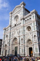 ITALY, Tuscany, Florence, Tourists in front of the Neo-Gothic marble west facade of the Cathedral of Santa Maria del Fiore, the Duomo.