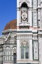 ITALY, Tuscany, Florence, The Neo-Gothic marble west facade of the Cathedral of Santa Maria del Fiore, the Duomo, with Brunellaschi's Dome beyond.