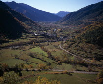 Village of Broto on valley floor and surrounding landscape in Autumn colours.