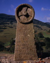 Chateau de Montsegur.    Carved stone erected to the memory of 200 members of the Cathar church burnt at the stake in March 1244 A.D.