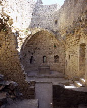 Chateau Peyrepertuse.  Ruined medieval Cathar castle stronghold.  St Mary s Chapel and altar.