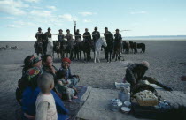 Gathering for ceremony of libation of first mare s milk of the season.