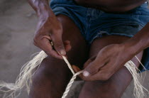 Close-up of Makuna man making cumare palm fibre rope.Tukano  Makuna Indian North Western Amazonia American Colombian Columbia Fiber Hispanic Indegent Latin America Latino Male Men Guy South America Tu...