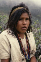 Portrait of Ika shepherd girl in the high pastures of the Sierra.Strings of coloured glass beads denote family wealthArhuaco Aruaco indigenous tribe American Colombian Colombia Female Lady Hispanic I...