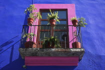 Colourful balcony of a typical house near the Zocalo