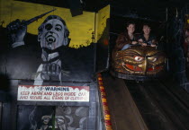 Ghost train car on Brighton Pier.