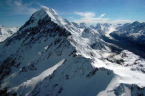 MOUNT COOK NATIONAL PARK  AERIAL VIEW NEW ZEALANDS HIGHEST MOUNTAIN MOUNT COOK  TOP LEFT SHOWING EAST AND WESTERN FACES  LOOKING ALONG THE TASMAN GLACIER  RIGHT .Antipodean Oceania Scenic